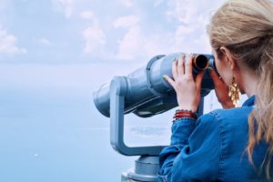 girl-sea-binoculars-vacation-160514